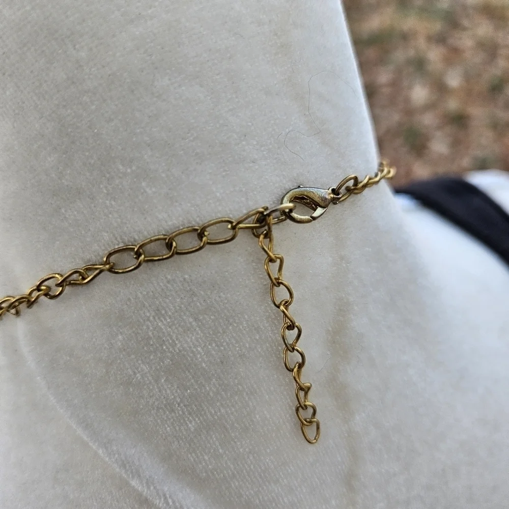 gold tone and red statement necklace